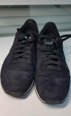 Nike negras online cuero