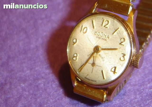 Reloj dogma 2024 oro