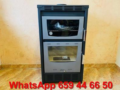 Estufa de leña con horno diferentes modelos de segunda mano por 290 EUR en  Murcia en WALLAPOP