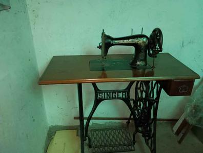 El curioso origen de las máquinas de coser antiguas y la historia Singer