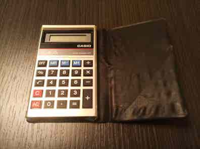 Calculatrice Casio LC-402 – Vintage – Format Poche – Occasion
