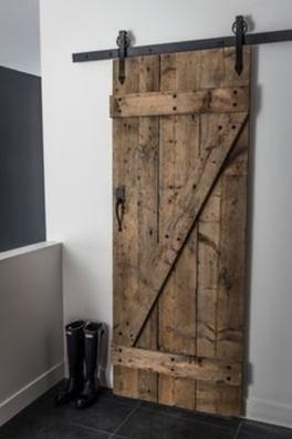 Kit de herrajes para una puerta corredera colgada de madera Barn