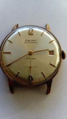 Precio reloj cauny prima antiguo sale