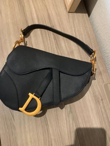 Bolso dior saddle discount negro