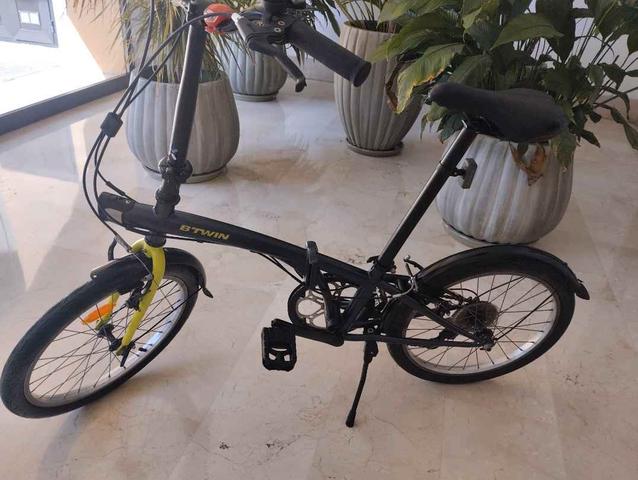 Bicicleta plegable btwin online segunda mano