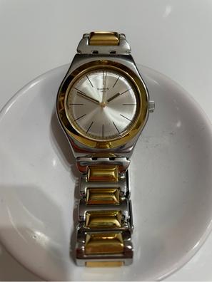 Reloj swatch dorado de segunda mano - GoTrendier