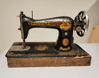 Máquina de coser antigua acoplada a - La casa de lámparas