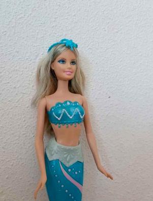 Barbie que se le mueven los brazos hot sale