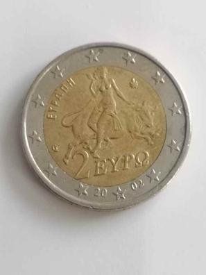 Tengo esta moneda de un euro del búho con un error que es que tiene una S  en la estrella que se encuentra entre la fecha de acuñación que fue acuñada  en