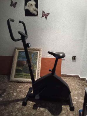 Bicicleta estática pequeña online domyos essential+