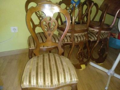 Pareja de sillones de madera de caoba con asientos de rejilla de