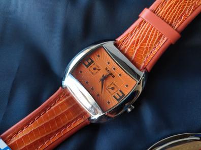 Reloj despertador analógico redondo color naranja estilo clásico