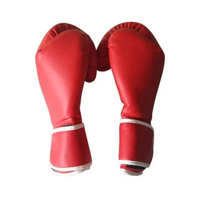 Kit saco de boxeo + guantes de 4oz para Niños Outshock rojo