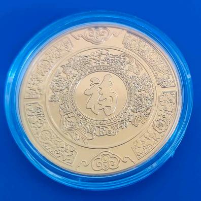 Moneda China Dorada –