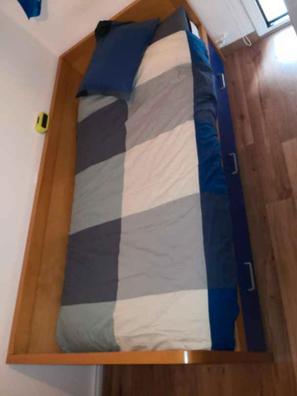 Dormitorio Juvenil con cama compacta con huecos de almacenaje