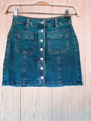 Falda vaquera botones y complementos de segunda mano barata |