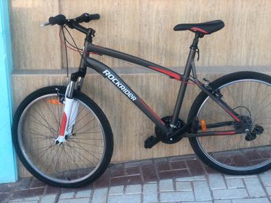 Bicicleta de montaña niños 24 pulgadas aluminio Rockrider ST 900 rojo 8-12  años