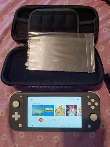 Milanuncios - Nintendo Switch Lite negra + funda y acc
