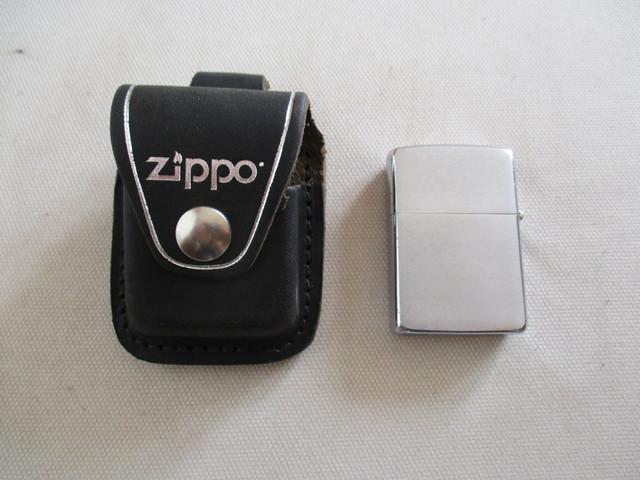 Milanuncios - mechero zippo, con su funda de cuero.