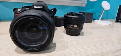 ​Nikon D5100 cámara réflex digital de 16.2 megapixeles y lente VR de 18-55  mm