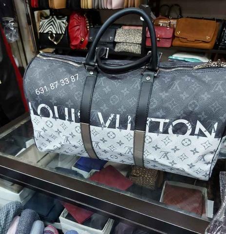 bolsa de viaje Keepall 50 con bandolera de Louis Vuitton. Precio