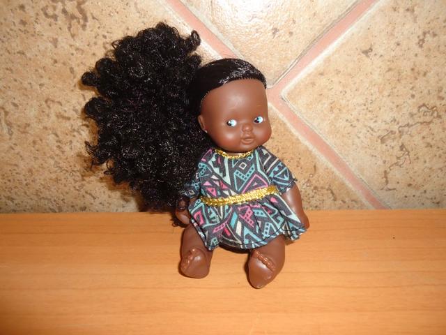 Muñeca barriguita negra online