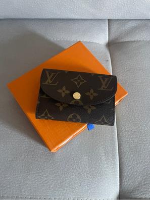Monedero con llavero Louis Vuitton de segunda mano por 220 EUR en
