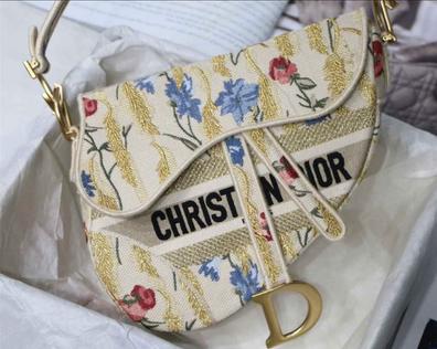 Bolso saddle dior segunda mano deals