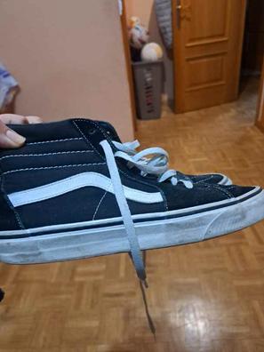 Vans negras clearance tachuelas