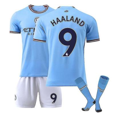 Camiseta PUMA de la 1ª equipación del Manchester City 2023-24 - Niños  dorsal Champions 23