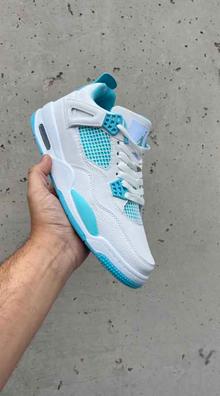 Jordan retro 4 amarillas hot sale