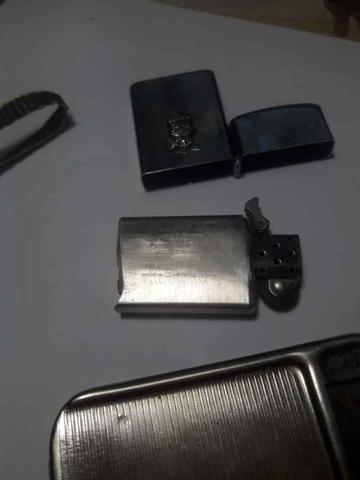 Milanuncios - mechero zippo, con su funda de cuero.