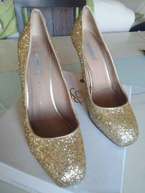 Preciosos zapatos de baile latino dorados con diamante