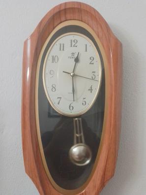 Reloj sobremesa o pared 23 Cm ancho por 14 Cmde alto.Reloj, Alarma, Fecha,  Mes, Dia y Temperatura