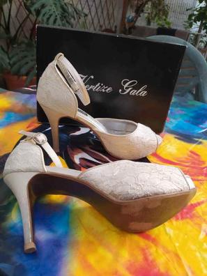 Tacones muy online altos