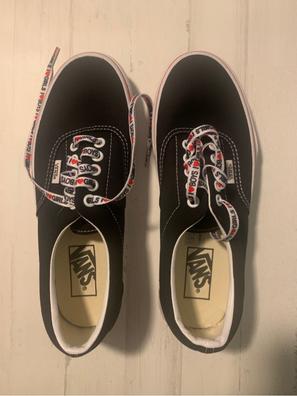 Vans negras outlet tachuelas