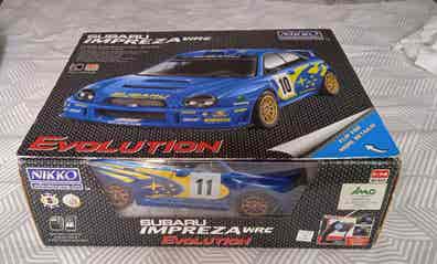 Nikko Evolution Subaru Impreza WRC - Voiture Télécommandée - Échelle 1:14 - Rallye Vintage Bleu