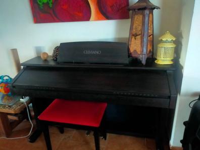 Taburete de piano de segunda mano en WALLAPOP