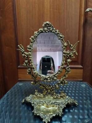 Espejo isabelino alargado con marco de resina plata dorado