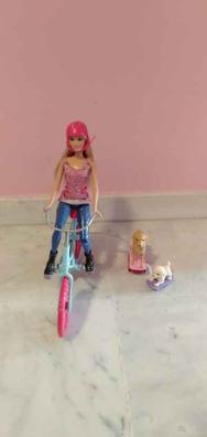 Barbie en cheap bicicleta con perritos