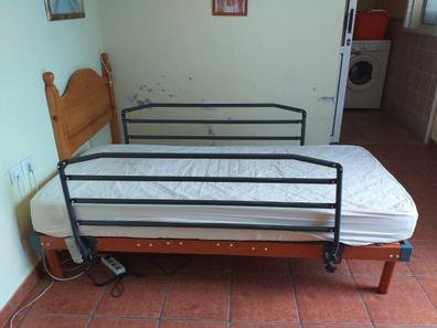 Mesa extensible para camas articuladas con barandillas