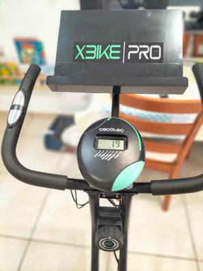 Cecotec Bicicleta Estática Plegable con Volante de Inercia de 2,5 Kg X-Bike  Pro. Sistema Silence Fit, Respaldo, Manillar y Sillín Regulable,  Pulsómetro, Pantalla LCD, Ruedas, Peso máximo 100 Kg en toda España